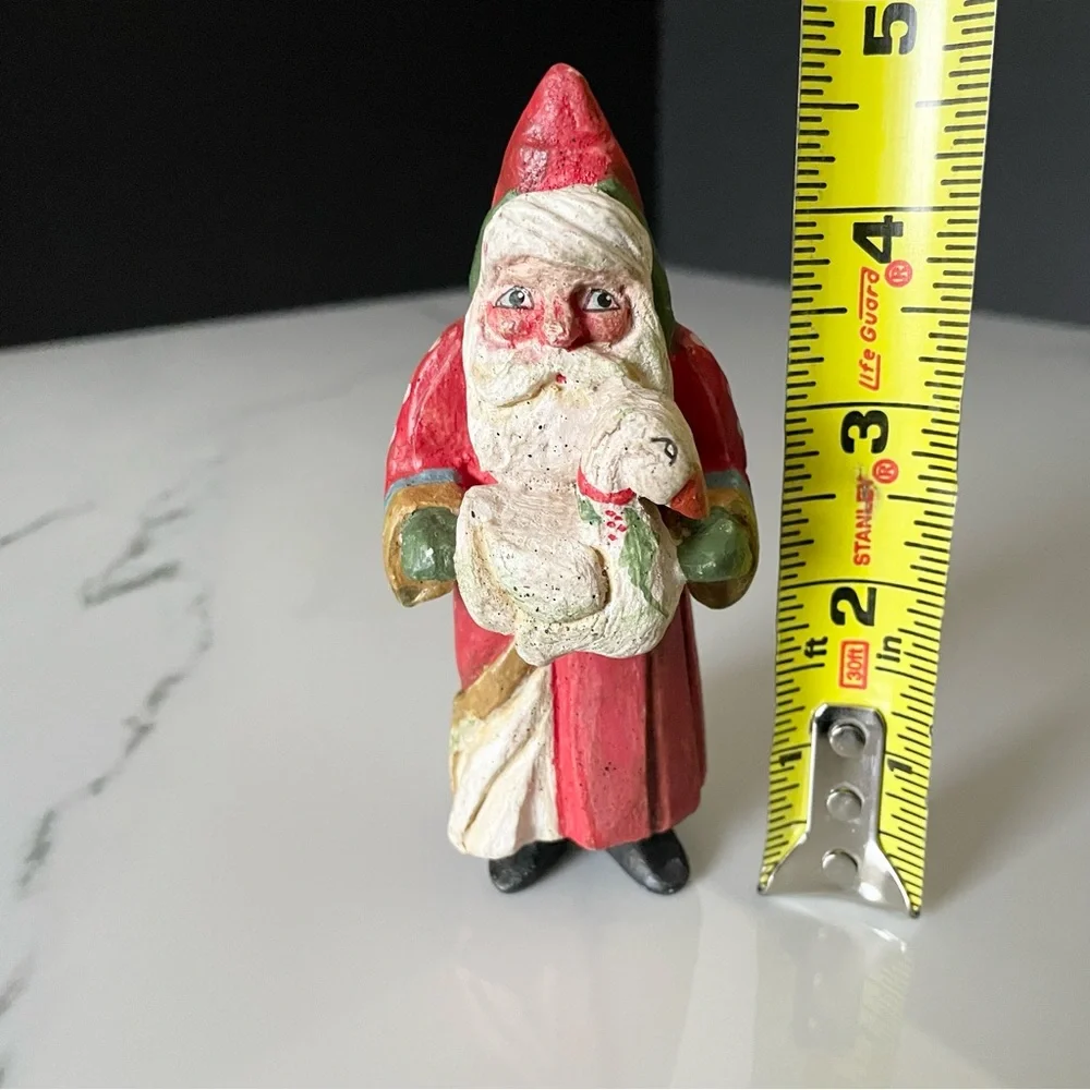 House Of Hatten santa holding